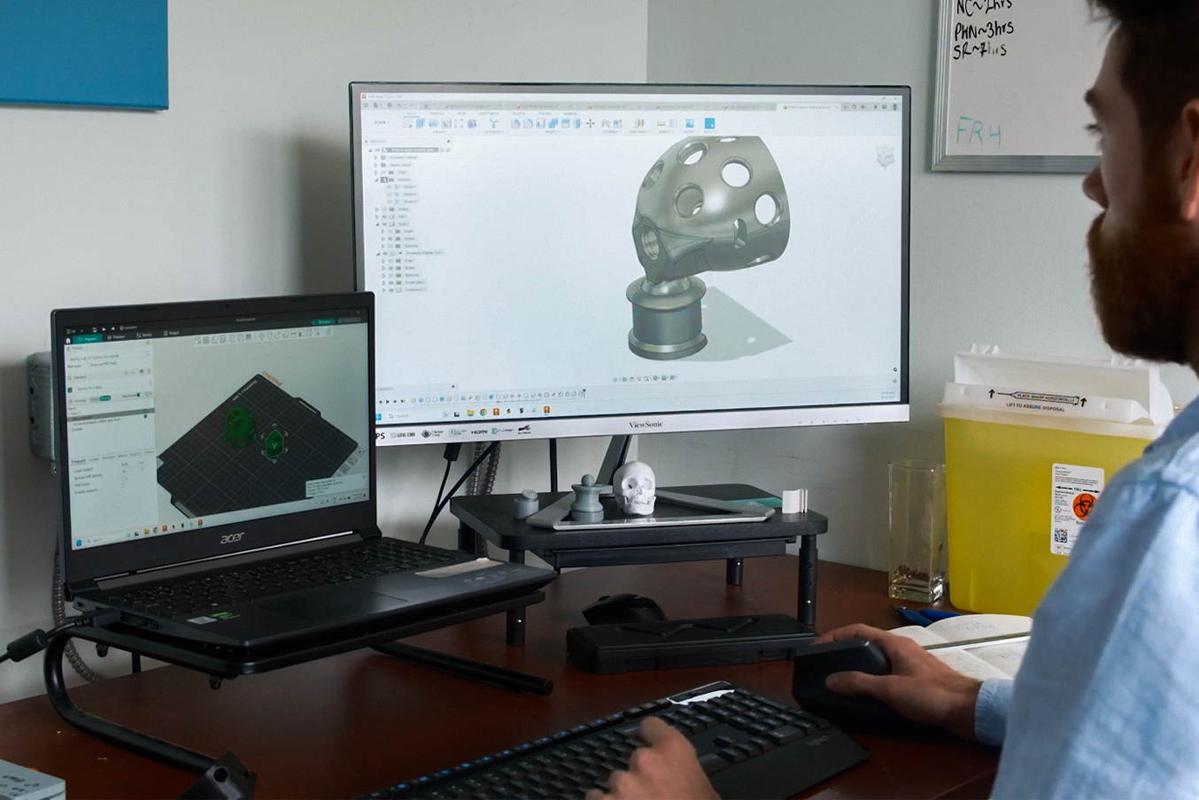 Person looking at 3D printed healthcare parts